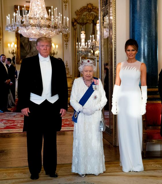 U.S. President Donald Trump, First Lady Melania Trump and Britain's Queen Elizabeth pose at the State Banquet at Buckingham Palace in London, Britain June 3, 2019. Doug Mills/Pool via REUTERS