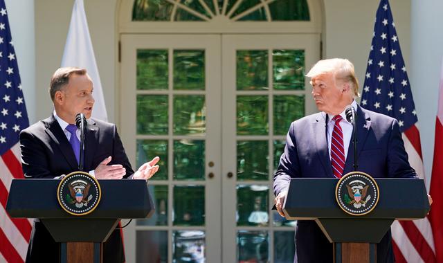 FILE PHOTO: U.S. President Donald Trump and Poland's President Andrzej Duda hold a joint news conference in the Rose Garden at the White House in Washington, U.S., June 12, 2019. REUTERS/Kevin Lamarque/File Photo