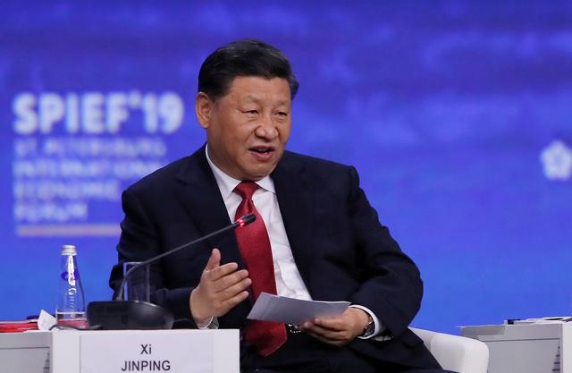 FILE PHOTO: Chinese President Xi Jinping speaks during a session of the St. Petersburg International Economic Forum (SPIEF), Russia June 7, 2019. REUTERS/Maxim Shemetov