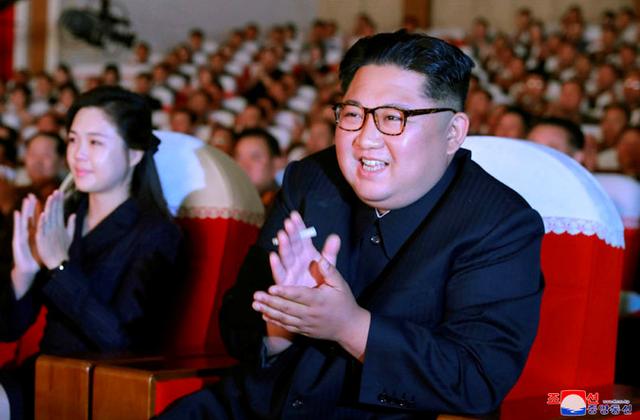 North Korean leader Kim Jong Un and his wife Ri Sol Ju watch a performance given by amateur art groups of the wives of officers of units of the Korean People's Army (KPA) selected in the seventh round of the second-term contest of art groups of KPA officers' wives, North Korea, in this undated photo released June 3, 2019 by North Korea's Korean Central News Agency (KCNA) in Pyongyang. KCNA/via REUTERS 