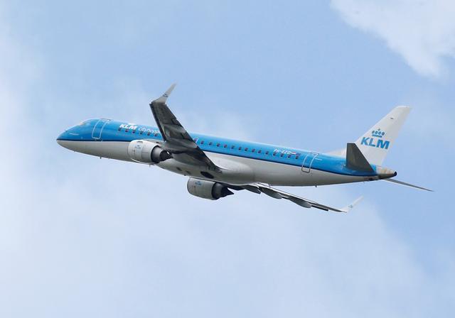 FILE PHOTO: A KLM commercial passenger jet takes off in Blagnac near Toulouse, France, May 29, 2019. REUTERS/Regis Duvignau