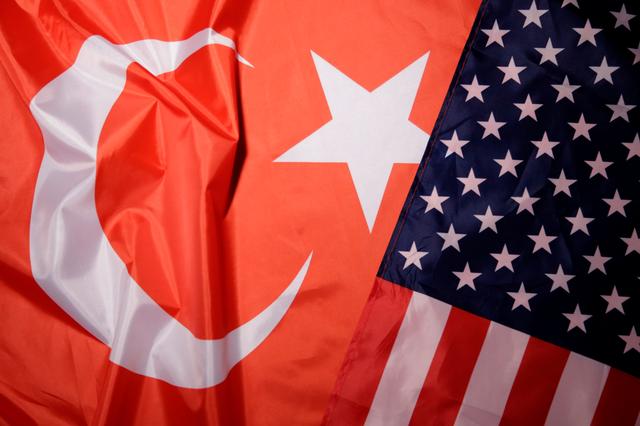 Turkey and U.S. flags are seen in this picture illustration taken August 25, 2018. REUTERS/Dado Ruvic/Illustration