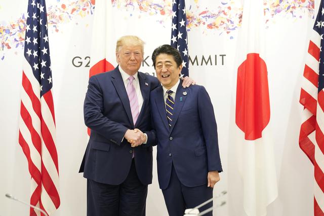 U.S. President Donald Trump shakes hands with Japan's Prime Minister Shinzo Abe during the G20 leaders summit in Osaka, Japan, June 28, 2019. REUTERS/Kevin Lamarque