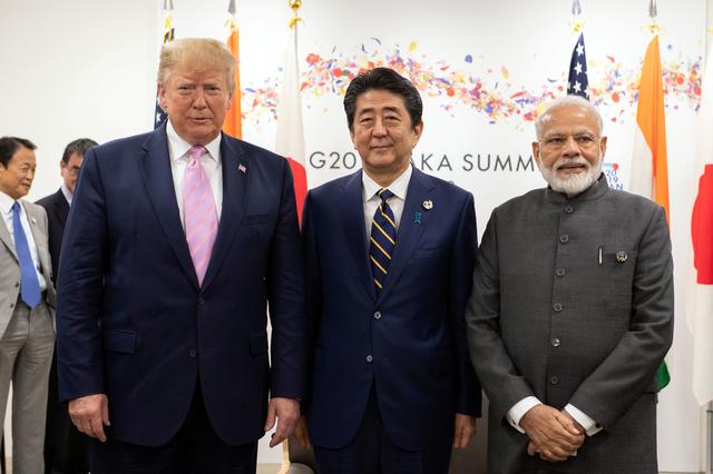 U.S President Donald Trump, Japan's Prime Minister, Shinzo Abe and India's Prime Minister Narendra Modi take part in a trilateral meeting on the first day of the G20 summit on June 28, 2019 in Osaka, Japan. Carl Court/Pool via REUTERS