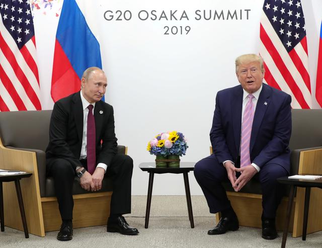 Russia's President Vladimir Putin and U.S. President Donald Trump attend a meeting on the sidelines of the G20 summit in Osaka, Japan June 28, 2019. Sputnik/Mikhail Klimentyev/Kremlin via REUTERS