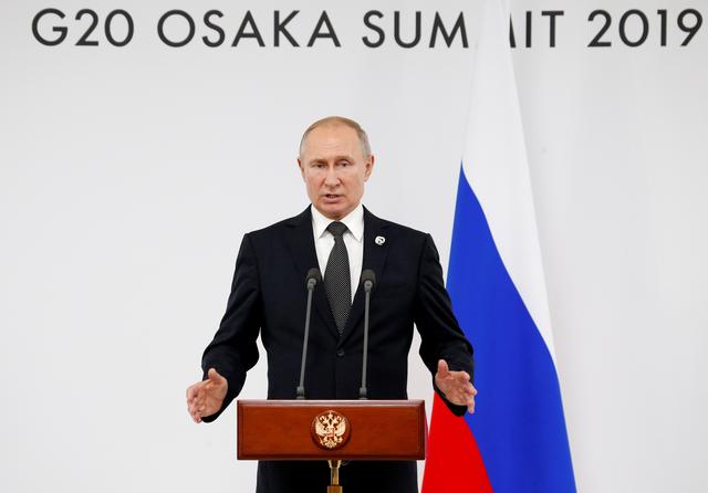 Russian President Vladimir Putin speaks to the media at the G-20 summit in Osaka, western Japan, June 29, 2019.  Alexander Zemlianichenko/Pool via REUTERS