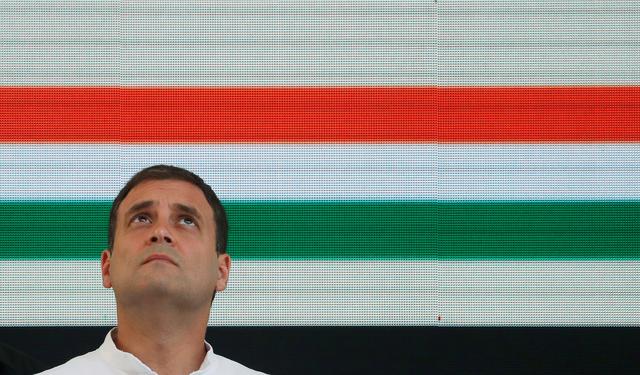 FILE PHOTO: Rahul Gandhi, President of India's main opposition Congress party, looks up before releasing his party's election manifesto for the April/May general election in New Delhi, India, April 2, 2019. REUTERS/Adnan Abidi/File Photo