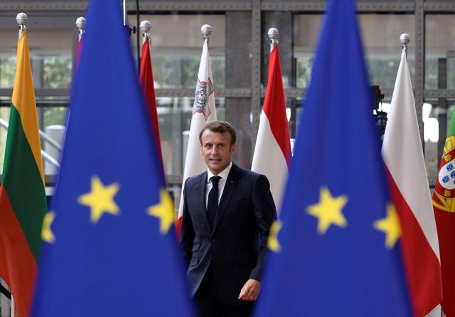 FILE PHOTO: French President Emmanuel Macron arrives for a European Union leaders summit that aims to select candidates for top EU institution jobs, in Brussels, Belgium June 30, 2019. REUTERS/Johanna Geron/File Photo