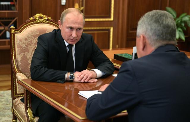 Russia's President Vladimir Putin meets with Defence Minister Sergei Shoigu to discuss a recent incident with a Russian deep-sea submersible, which caught fire in the area of the Barents Sea, in Moscow, Russia July 2, 2019. Sputnik/Alexey Druzhinin/Kremlin via REUTERS  