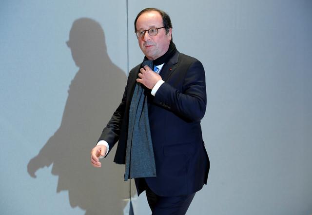 FILE PHOTO - Former French President Francois Hollande arrives to attend the 34th annual dinner of the Representative Council of Jewish Institutions of France (CRIF - Conseil Representatif des Institutions juives de France) in Paris, France February 20, 2019. REUTERS/Philippe Wojazer