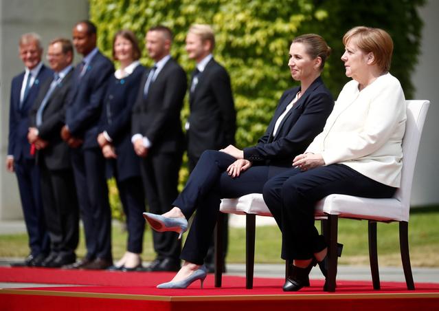 German Chancellor Angela Merkel receives Denmark's Prime Minister Mette Frederiksen with military honours at the Chancellery in Berlin, Germany, July 11, 2019. REUTERS/Hannibal Hanschke