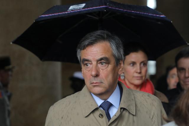 FILE PHOTO: Former French Prime Minister Francois Fillon leaves after a national ceremony for late Lieutenant-Colonel Arnaud Beltrame at the Hotel des Invalides in Paris, France, March 28, 2018.  Ludovic Marin/Pool via Reuters
