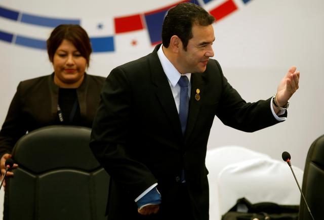 FILE PHOTO: Guatemala's President Jimmy Morales gestures during a meeting of the Central American Integration System (SICA), in Guatemala City, Guatemala June 5, 2019. REUTERS/Luis Echeverria/File Photo