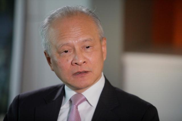 FILE PHOTO: China's ambassador to the United States Cui Tiankai responds to reporters questions during an interview with Reuters in Washington, U.S., November 6, 2018. REUTERS/Jim Bourg/File Photo