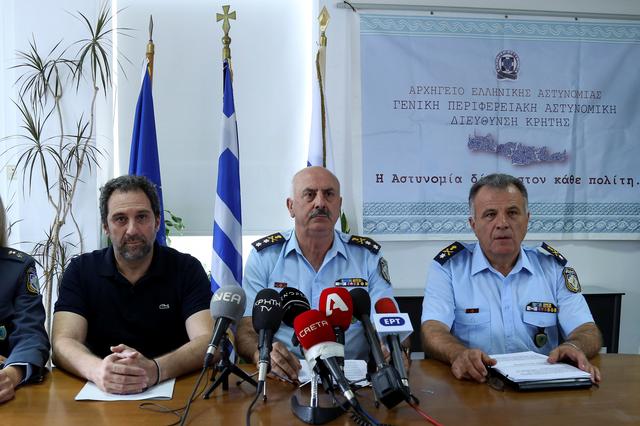 Crete's Chief of Police Konstantinos Lagoudakis (C), Chania Police Chief Giorgos Libinakis (R) and Director of Security for Chania Police Paris Chinopoulos are seen during a news conference, presenting the latest developments on the murder of American biologist Suzanne Eaton, in Chania, on the island of Crete, Greece July 16, 2019. REUTERS/Makis Kartsonakis 