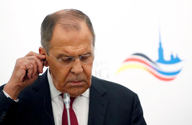 FILE PHOTO: Russian Foreign Minister Sergei Lavrov and German Foreign Minister Heiko Maas (not pictured) attend a joint news conference at Petersberg mountain on the sidelines of the so-called Petersburg Dialogue to speak on the conflict in Ukraine and the future of arms control in Koenigswinter near Bonn, Germany, July 18, 2019.  REUTERS/Wolfgang Rattay