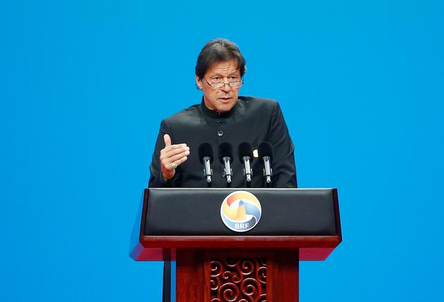 FILE PHOTO: Pakistani Prime Minister Imran Khan delivers a speech at the opening ceremony for the second Belt and Road Forum in Beijing, China, April 26, 2019. REUTERS/Florence Lo