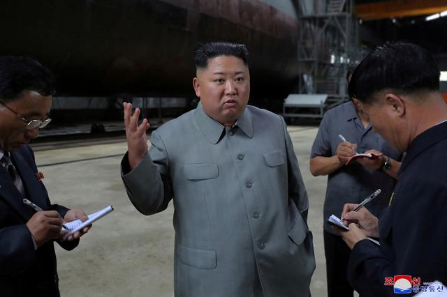 North Korean leader Kim Jong Un visits a submarine factory in an undisclosed location, North Korea, in this undated picture released by North Korea's Central News Agency (KCNA) on July 23, 2019.    KCNA via REUTERS 