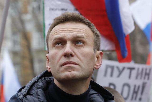 FILE PHOTO: Russian opposition leader Alexei Navalny attends a rally in memory of politician Boris Nemtsov, who was assassinated in 2015, in Moscow, Russia February 24, 2019. REUTERS/Tatyana Makeyeva