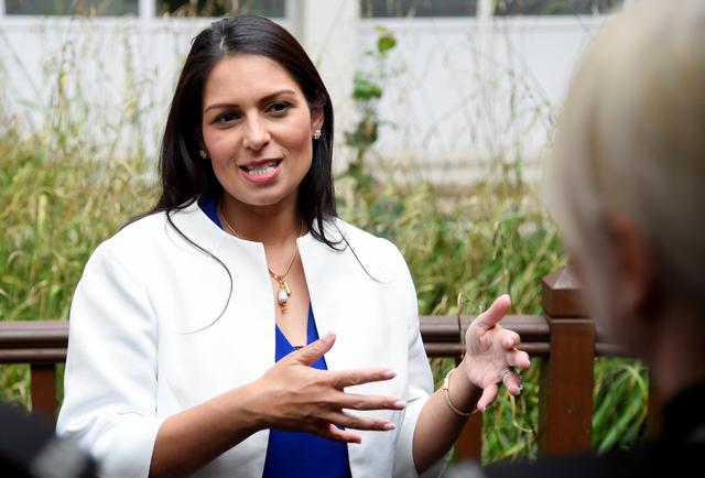 Britain's Home Secretary Priti Patel gestures as she speaks during a visit to the West Midlands Police Learning & Development Centre in Birmingham, Britain July 26, 2019. REUTERS/Toby Melville/Pool