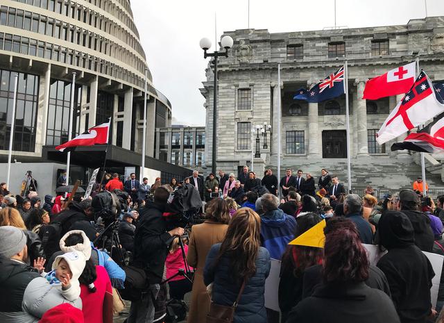 Ministers address hundreds of Maori protesters gathered to demonstrate against what protesters say is the disproportionate number of Maori children taken by social service agencies from their families, outside parliament in Wellington, New Zealand, July 30, 2019. REUTERS/Praveen Menon