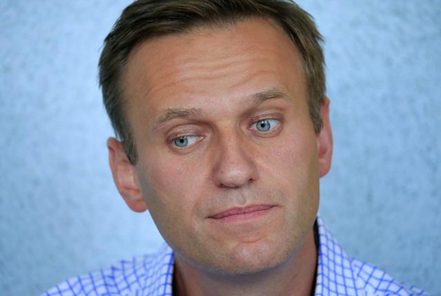 FILE PHOTO: Russian opposition leader Alexei Navalny, who is charged with participation in an unauthorised protest rally, attends a court hearing in Moscow, Russia July 1, 2019. REUTERS/Tatyana Makeyeva/File Photo