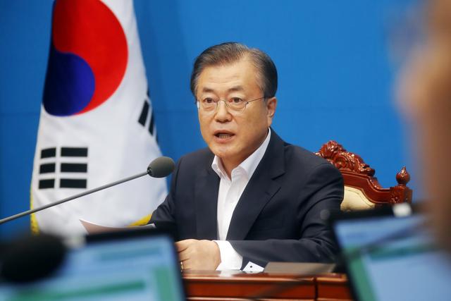 South Korean President Moon Jae-in speaks during an irregular cabinet meeting at the Presidential Blue House in Seoul, South Korea, August 2, 2019. Yonhap via REUTERS   