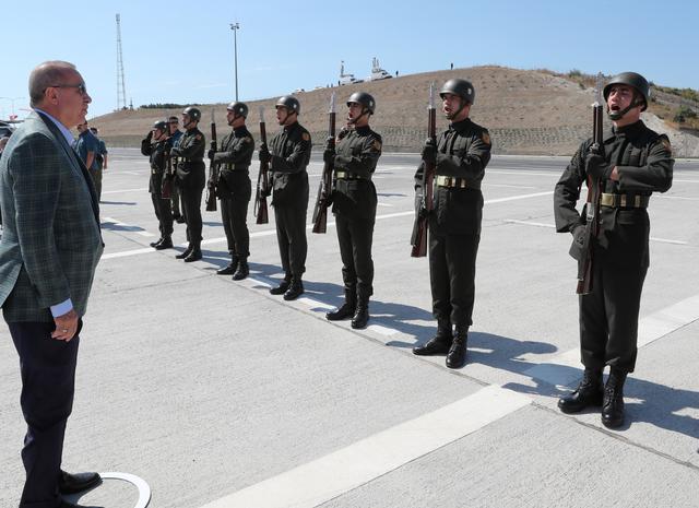 Turkish President Tayyip Erdogan reviews a guard of honour at the airport in Bursa, Turkey, August 4, 2019. Kayhan Ozer/Presidential Press Office/Handout via REUTERS ATTENTION EDITORS - THIS PICTURE WAS PROVIDED BY A THIRD PARTY. NO RESALES. NO ARCHIVE