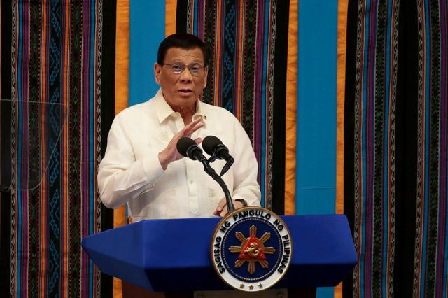 FILE PHOTO: Philippine President Rodrigo Duterte gestures during his fourth State of the Nation Address at the Philippine Congress in Quezon City, Metro Manila, Philippines July 22, 2019. REUTERS/Eloisa Lopez