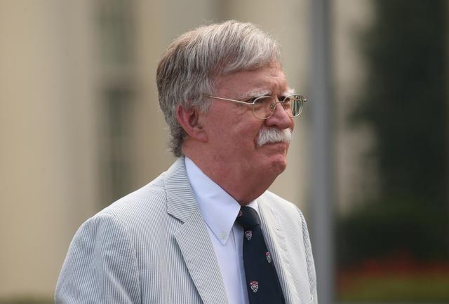U.S. National Security Adviser John Bolton walks to give an interview to Fox News outside of the White House in Washington, U.S. July 31, 2019. REUTERS/Leah Millis