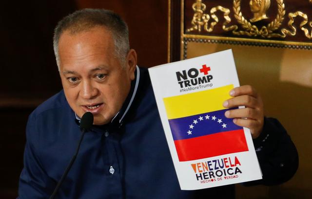 Venezuela's National Constituent Assembly President Diosdado Cabello holds a banner reading No more Trump. Heroic Venezuela during a session in Caracas, Venezuela August 12, 2019. REUTERS/Manaure Quintero