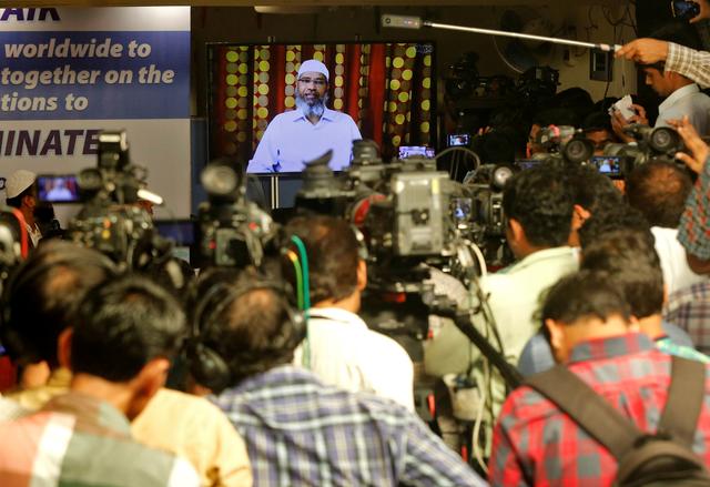 FILE PHOTO: Zakir Naik, an Indian Islamic preacher and founder of Islamic Research Foundation, speaks to the media via a video conference in Mumbai, India, July 15, 2016. REUTERS/Shailesh Andrade