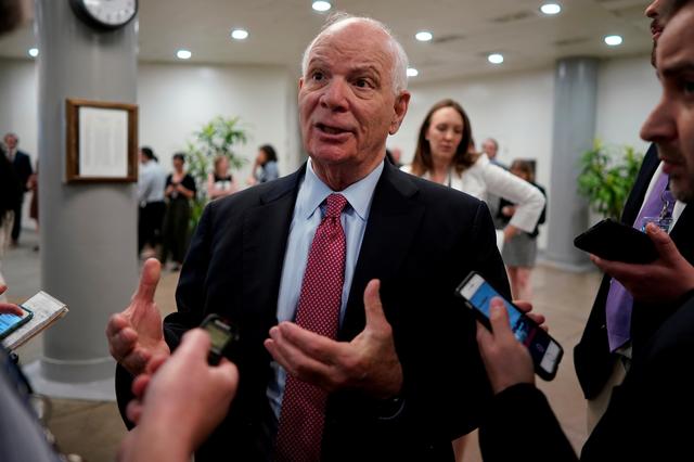 FILE PHOTO: U.S. Senator Ben Cardin (D-MD) speaks with reporters ahead of the weekly policy luncheons on Capitol Hill in Washington, U.S., May 7, 2019. REUTERS/Aaron P. Bernstein/File Photo