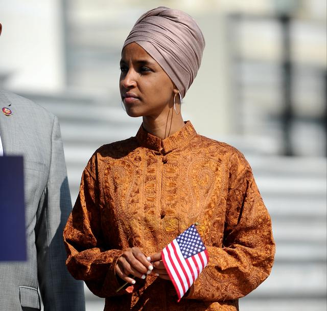 FILE PHOTO: Rep. Ilhan Omar (D-MN) attends a press event on the first 200 days of the 116th Congress at the U.S. Capitol in Washington, U.S., July 25, 2019. REUTERS/Mary F. Calvert