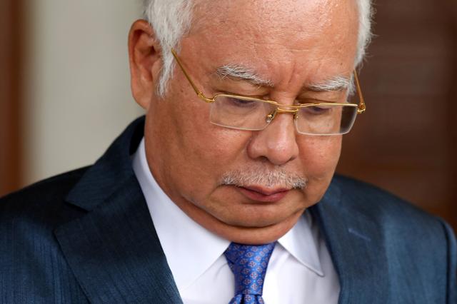 FILE PHOTO: Malaysia's former prime minister, Najib Razak, leaves Kuala Lumpur High Court in Kuala Lumpur, Malaysia, July 15, 2019. REUTERS/Lim Huey Teng/File Photo