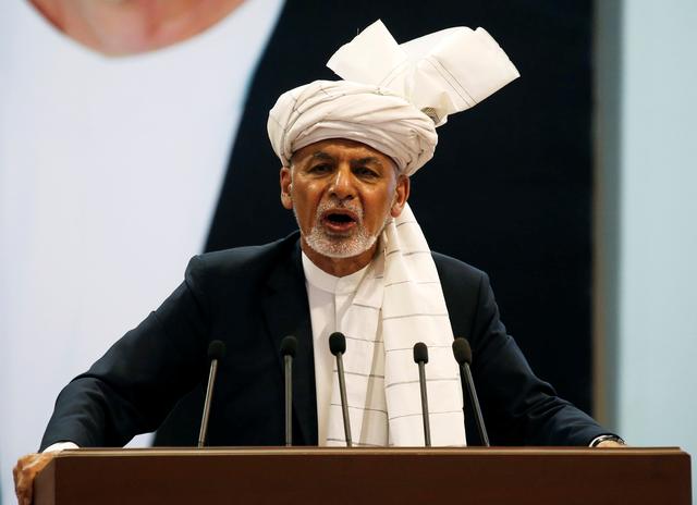 FILE PHOTO: Afghanistan's President Ashraf Ghani speaks during a consultative grand assembly, known as Loya Jirga, in Kabul, Afghanistan April 29, 2019. REUTERS/Omar Sobhani/File Photo
