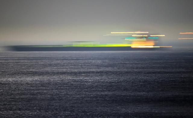 Iranian oil tanker Adrian Darya 1, previously named Grace 1, sails after the Supreme Court of the British territory lifted its detention order, in the Strait of Gibraltar, Spain, August 19, 2019. Picture taken with long exposure. REUTERS/Jon Nazca