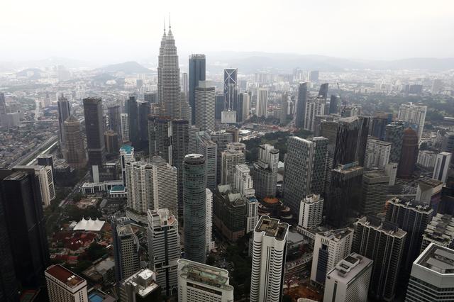 FILE PHOTO: A view of the Kuala Lumpur city skyline in Malaysia February 7, 2018. REUTERS/Lai Seng Sin