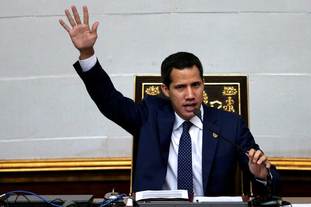 FILE PHOTO: Venezuelan opposition leader Juan Guaido, who many nations have recognized as the country's rightful interim ruler, attends a session of Venezuela's National Assembly in Caracas, Venezuela August 20, 2019. REUTERS/Manaure Quintero/File Photo