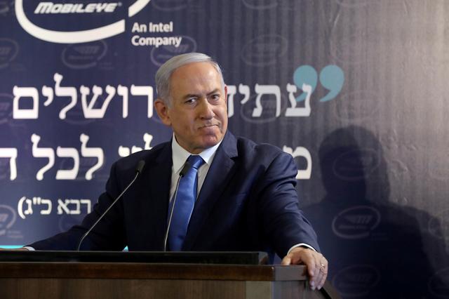 FILE PHOTO: Israeli Prime Minister Benjamin Netanyahu speaks during a cornerstone-laying ceremony for Mobileye's center in Jerusalem August 27, 2019. Abir Sultan/Pool via REUTERS/File Photo