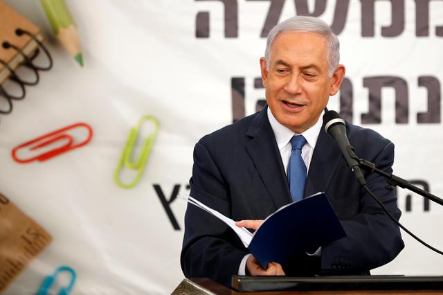 Israeli Prime Minister Benjamin Netanyahu speaks during a ceremony opening the school year in the Jewish settlement of Elkana in the Israeli-occupied West Bank September 1, 2019. REUTERS/Amir Cohen