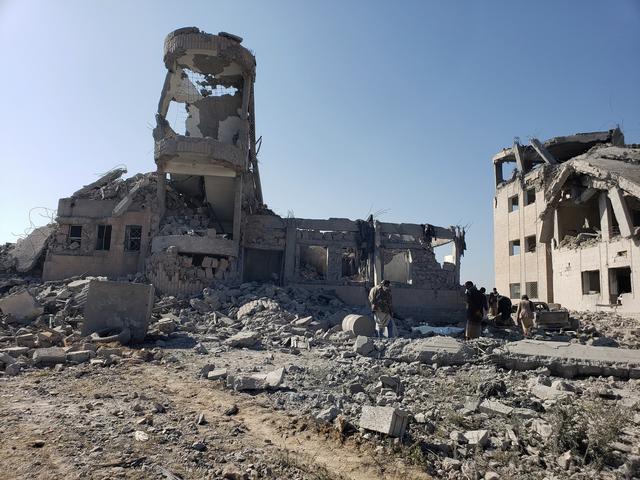 FILE PHOTO: People inspect the site of Saudi-led air strikes on a Houthi detention centre in Dhamar, Yemen September 1, 2019. REUTERS/Ahmed al-Ansi