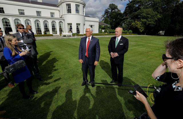 U.S. Vice-President Mike Pence speaks to the Press with  US Ambassador to Ireland Edward Crawford after a meeting with business leaders the Ambassadors residence in Dublin, Ireland September 3, 2019. REUTERS/Lorraine O'Sullivan