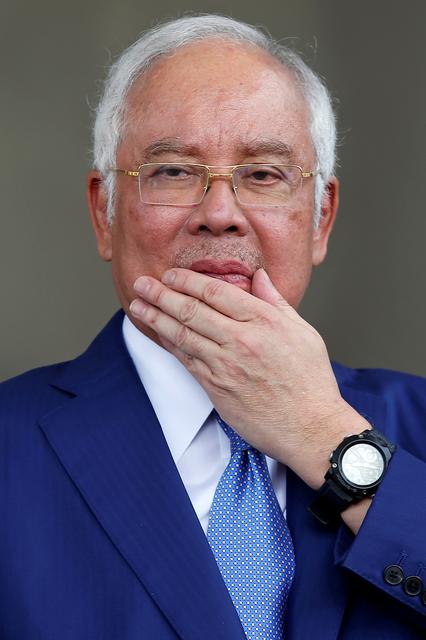 FILE PHOTO: Former Malaysian Prime Minister Najib Razak leaves Kuala Lumpur High Court in Kuala Lumpur, Malaysia August 28, 2019. REUTERS/Lai Seng Sin