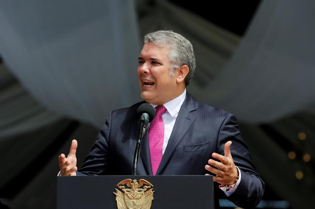 FILE PHOTO: Colombia's President Ivan Duque speaks during the F-Air Colombia 2019 air festival in Rionegro, Colombia July 13, 2019. REUTERS/David Estrada/File Photo