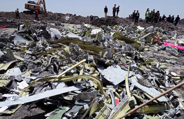 FILE PHOTO -Wreckage is seen at the site of the Ethiopian Airlines Flight ET 302 plane crash, near the town of Bishoftu, southeast of Addis Ababa, Ethiopia March 11, 2019. REUTERS/Tiksa Negeri