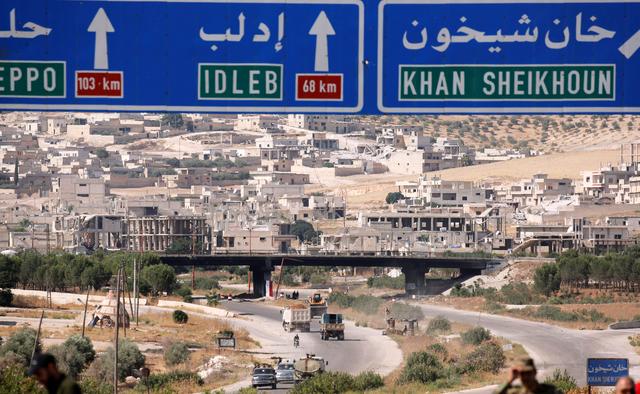 Road direction signs are pictured at the entrance enroute to Khan Sheikhoun, Idlib, Syria August 24, 2019. REUTERS/Omar Sanadiki