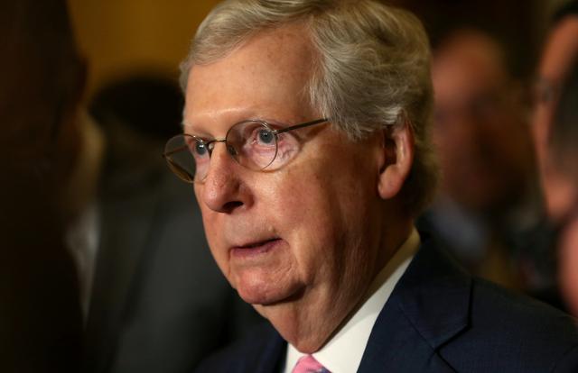 FILE PHOTO: U.S. Senate Majority Leader Mitch McConnell speaks to the news media after the weekly Republican Party caucus lunch meeting at the U.S. Capitol in Washington, U.S., June 25, 2019. REUTERS/Leah Millis/File Photo