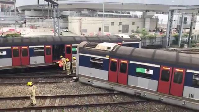 Emergency crew are seen at a derailed train wreckage near Hung Hom station on the MTR East Rail Line following an accident on a train bound for Mong Kok East in Hong Kong, China September 17, 2019 still image taken from a social media video.  @SEELIFEHK via REUTERS