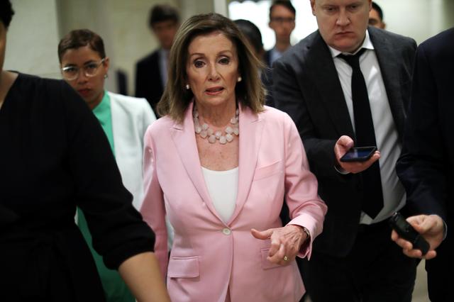 U.S. House Speaker Nancy Pelosi (D-CA) speaks with reporters following her weekly news conference on Capitol Hill in Washington, U.S. September 12, 2019.  REUTERS/Jonathan Ernst